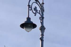 Photo of ornate Dublin streetlamp with a clover on top