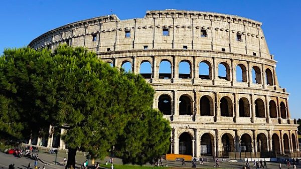 Areal view of Santorini Greece blue domed buildings with the ocean and islands in the background